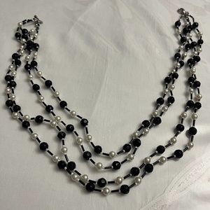 Black Beaded , white pearls